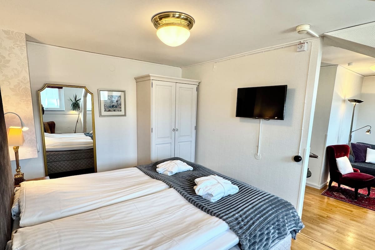 Suíte luxo, 1 cama King e sofá-cama | Roupas de cama premium, cofres nos quartos, individualmente decorados