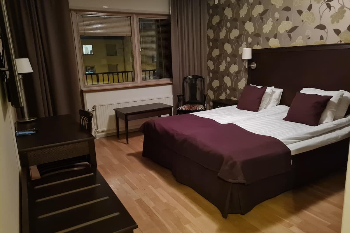 individually decorated, desk, blackout curtains, iron/ironing board