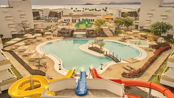 8 outdoor pools, pool umbrellas, pool loungers