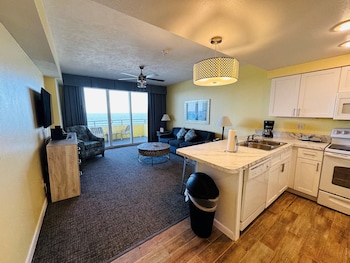 Condo, 1 Bedroom, Ocean View | Living area | 27-inch TV with cable channels, DVD player at Ocean Walk Resort