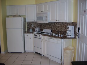 Suite, 1 Bedroom | Private kitchenette | Fridge, microwave, stovetop, coffee/tea maker
