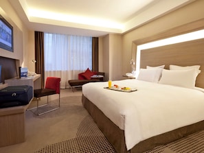 Superior Room, 1 Queen Bed, City View | Free minibar, in-room safe, desk, iron/ironing board