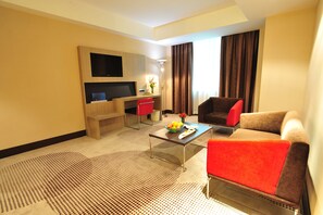 Free minibar, in-room safe, desk, iron/ironing board