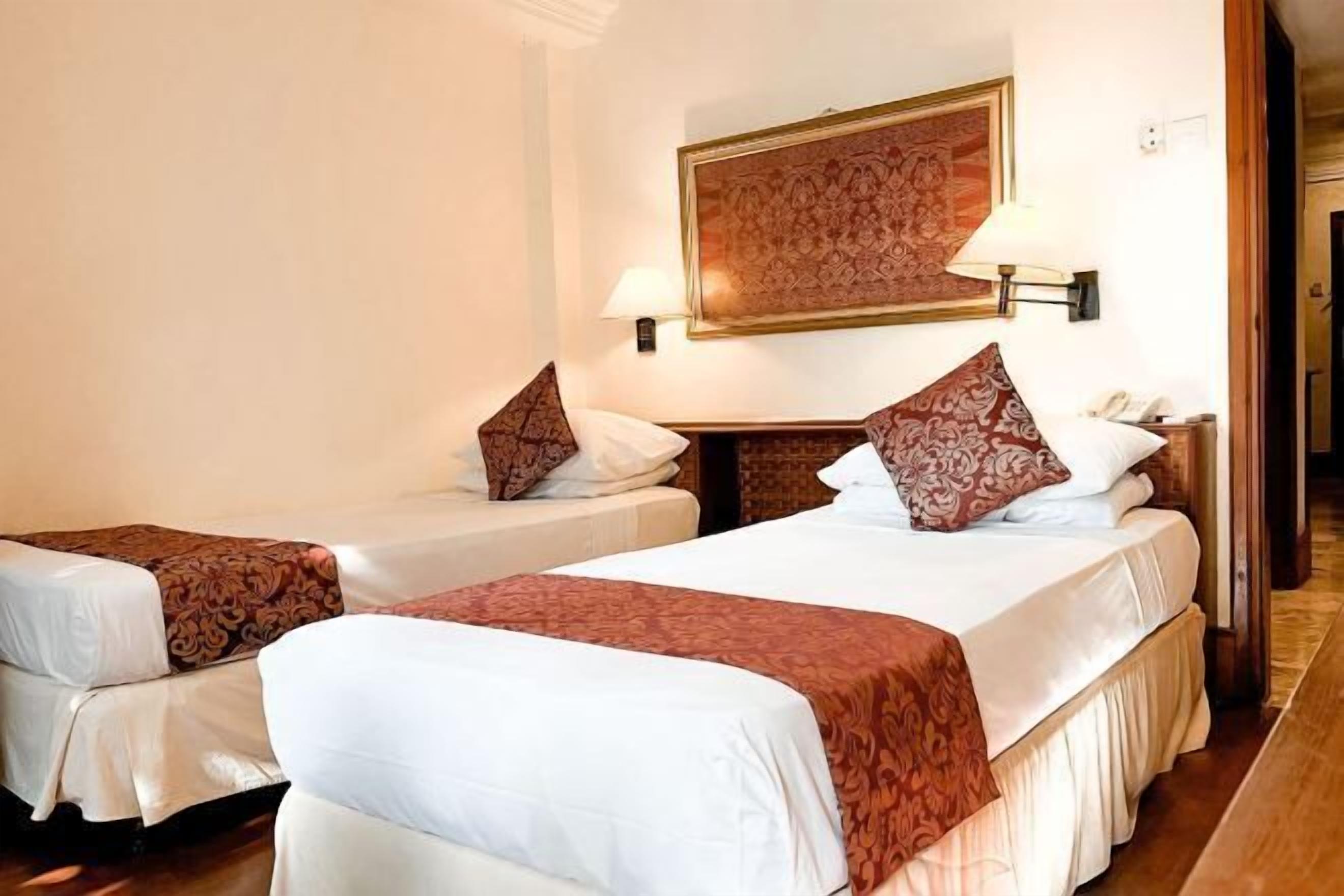 In-room safe, desk, iron/ironing board, cots/infant beds