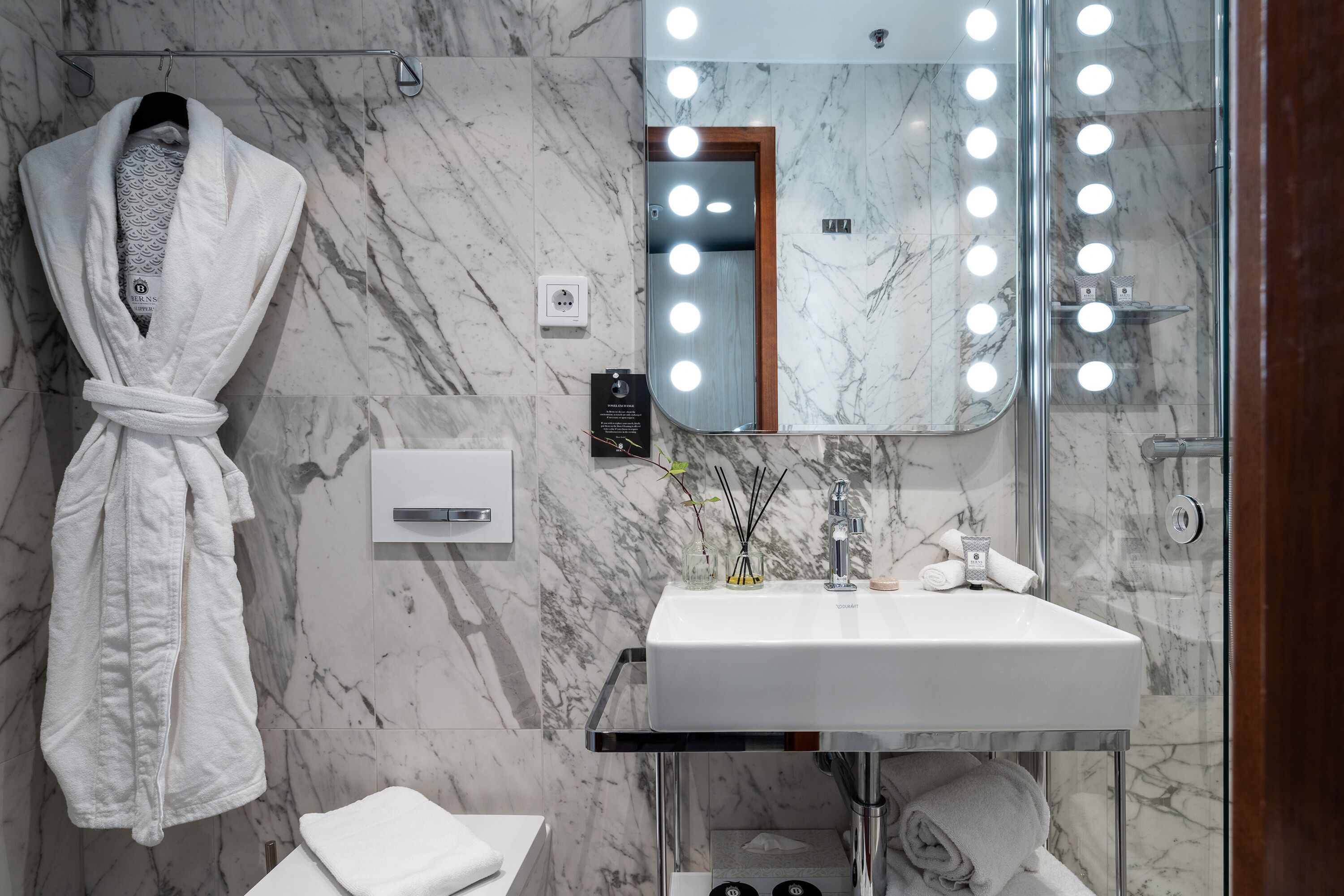 spacious superior | bathroom | eco-friendly toiletries, hair dryer, towels, soap