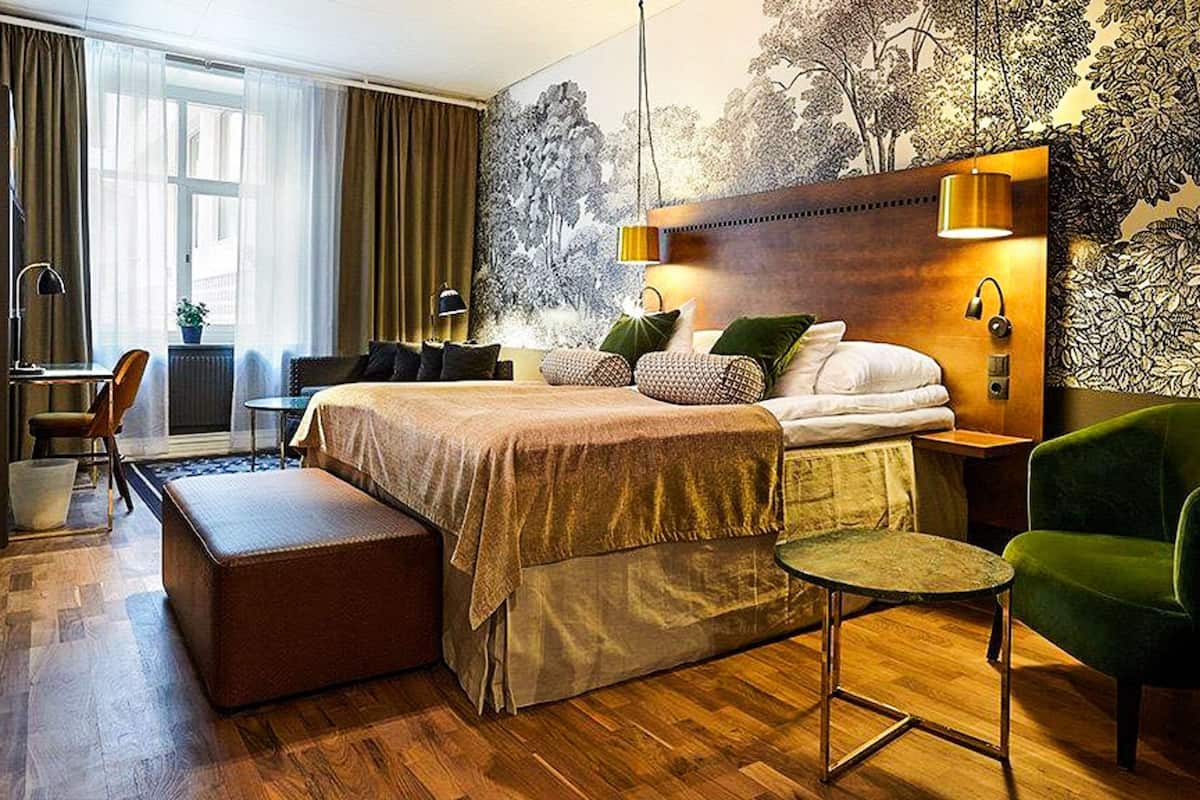 superior room | desk, blackout curtains, iron/ironing board, cots/infant beds