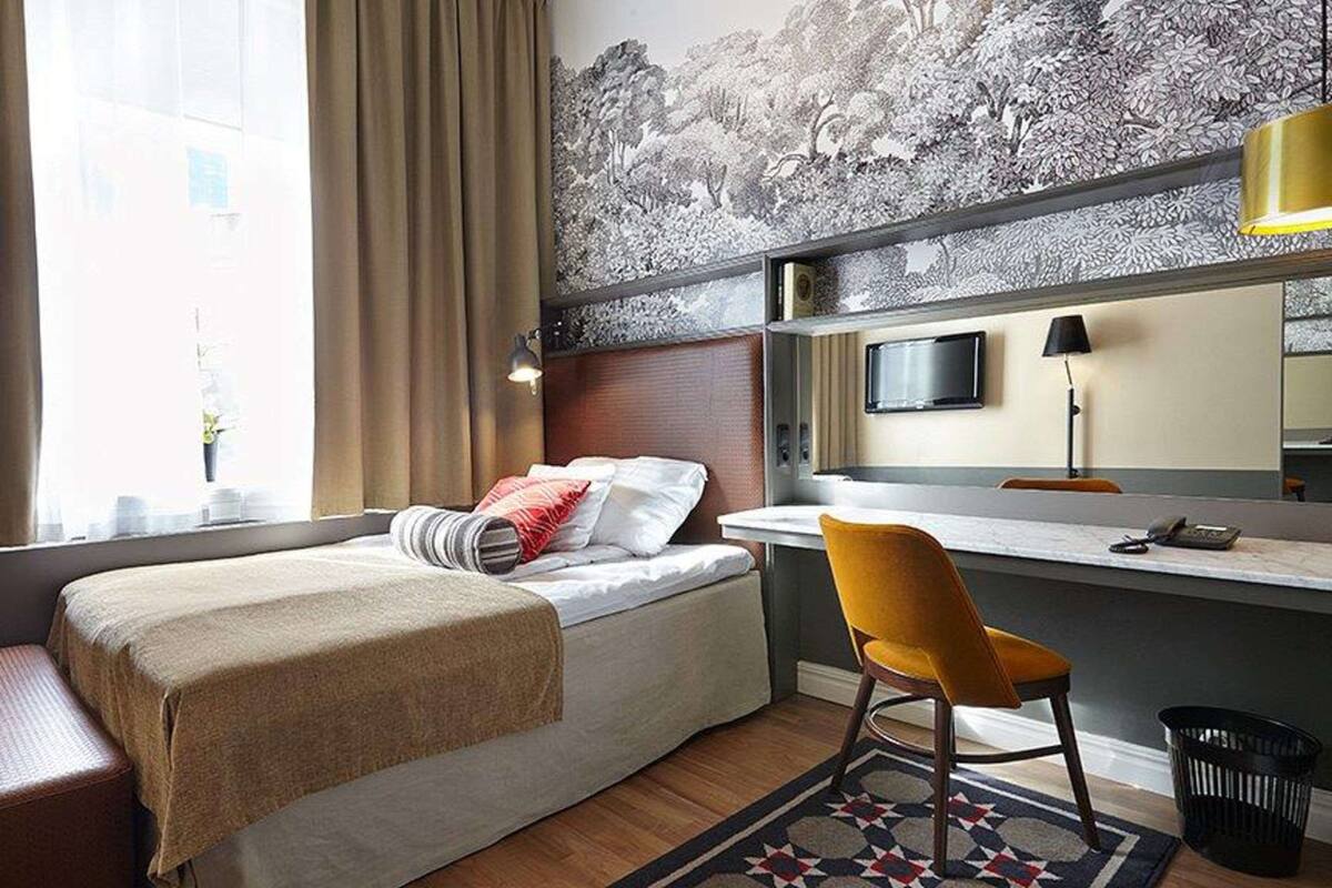 desk, blackout curtains, iron/ironing board, cots/infant beds