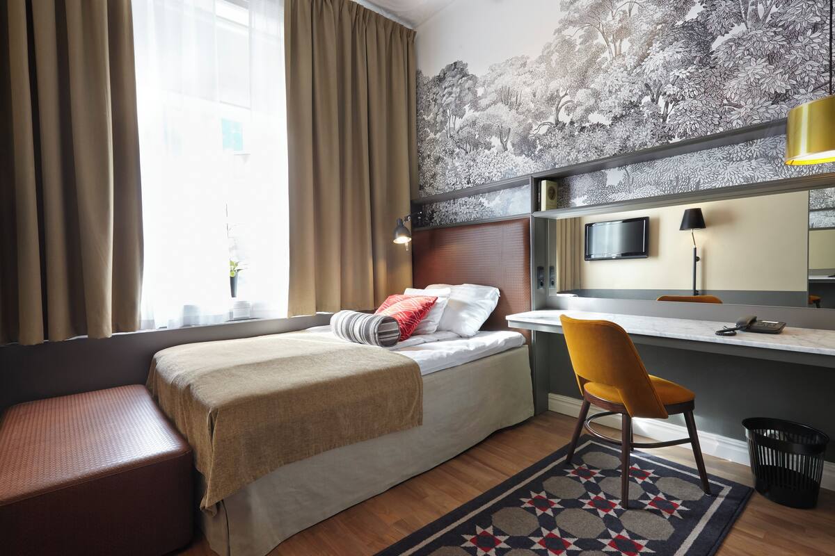 desk, blackout curtains, iron/ironing board, cots/infant beds