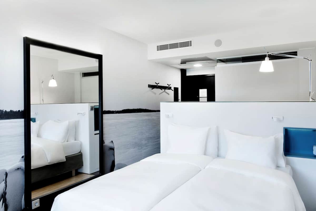 Premium bedding, memory-foam beds, minibar, in-room safe