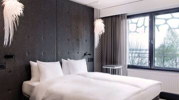 Premium bedding, memory-foam beds, minibar, in-room safe