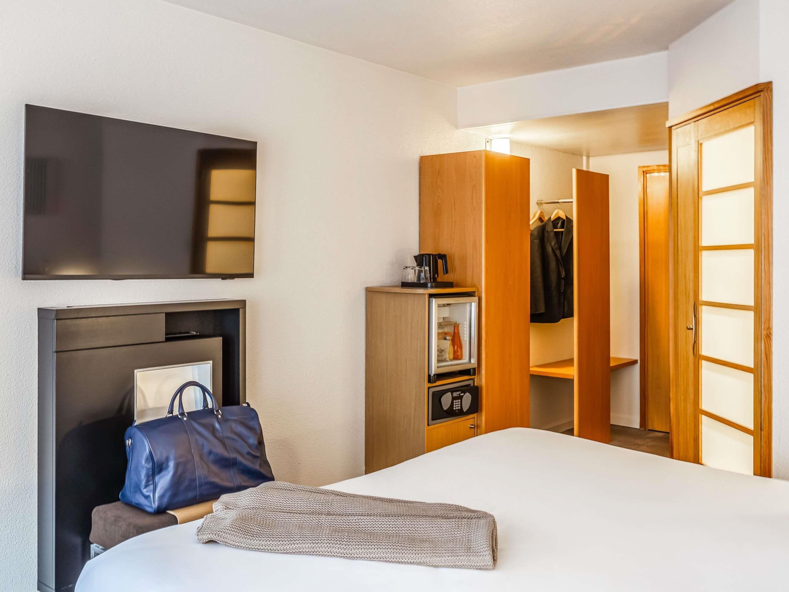 Literie de qualité supérieure, coffres-forts dans les chambres, bureau