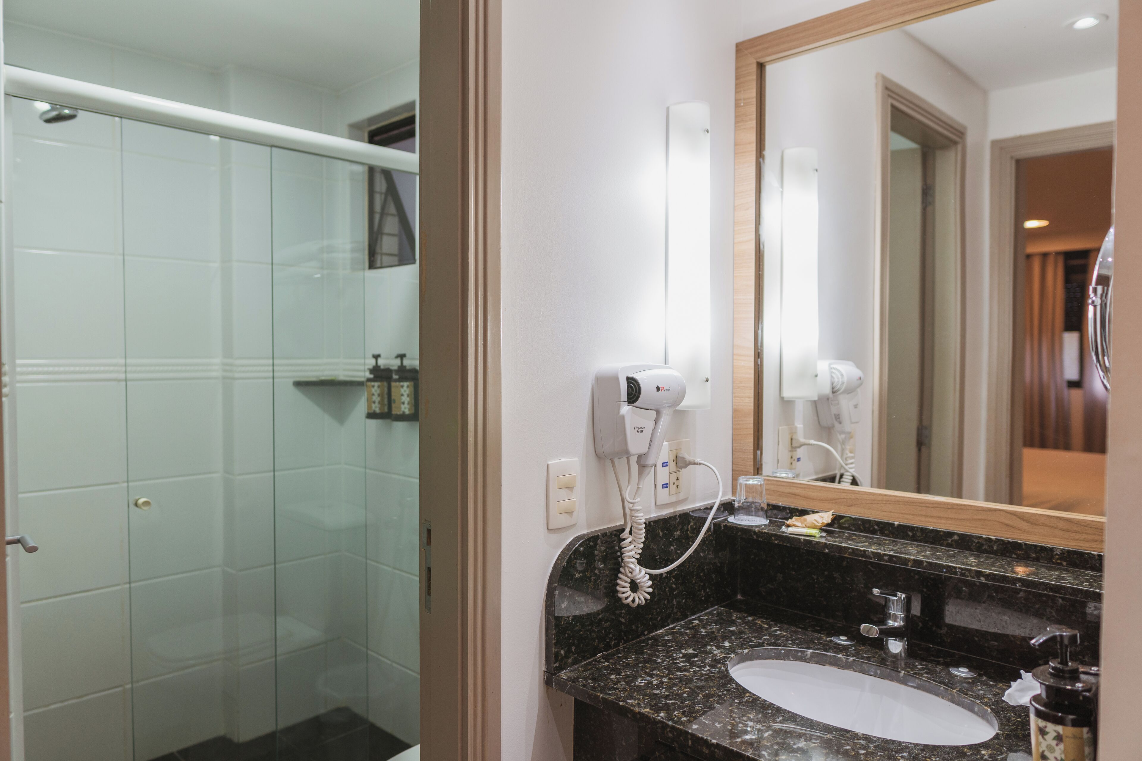 shower, eco-friendly toiletries, hair dryer, towels