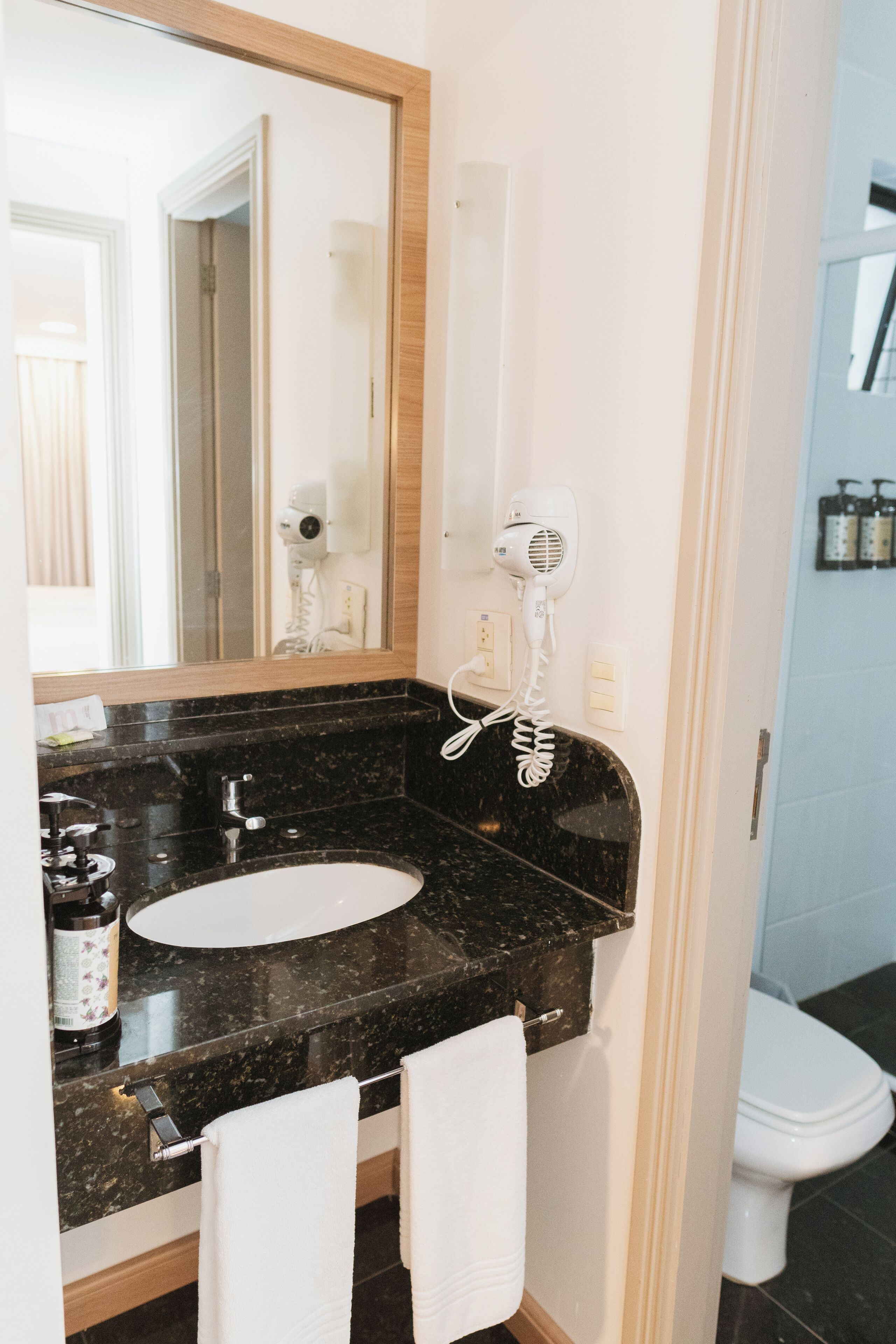 shower, eco-friendly toiletries, hair dryer, towels