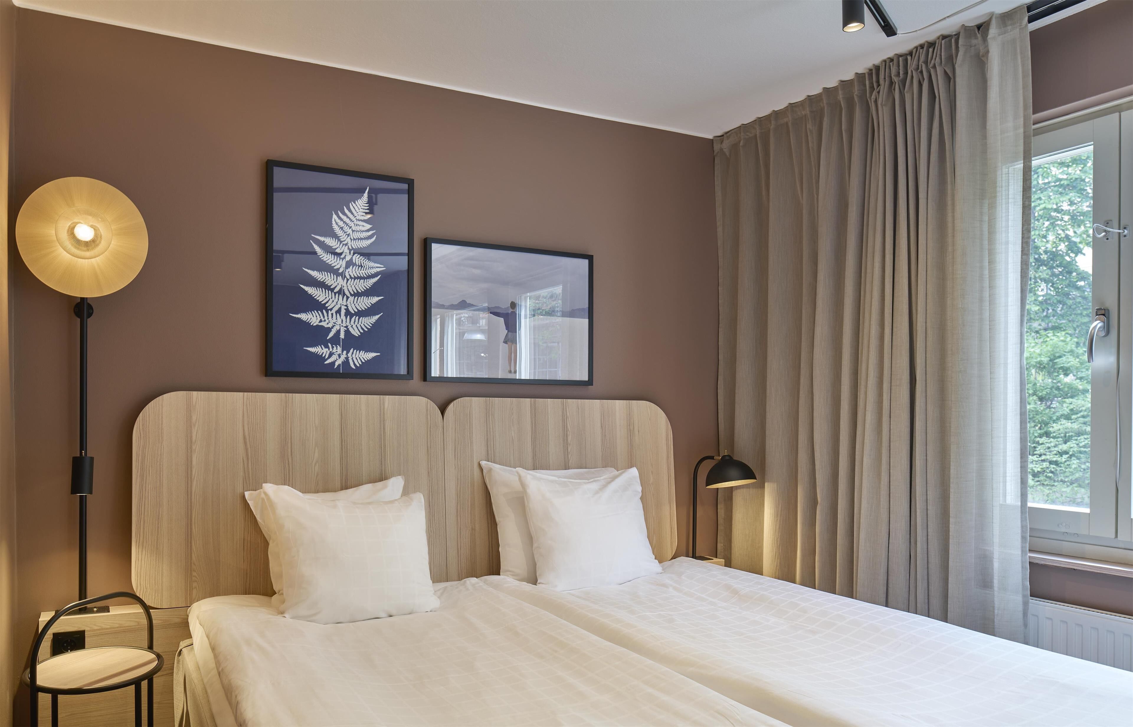 family room | 1 bedroom, desk, blackout curtains, iron/ironing board