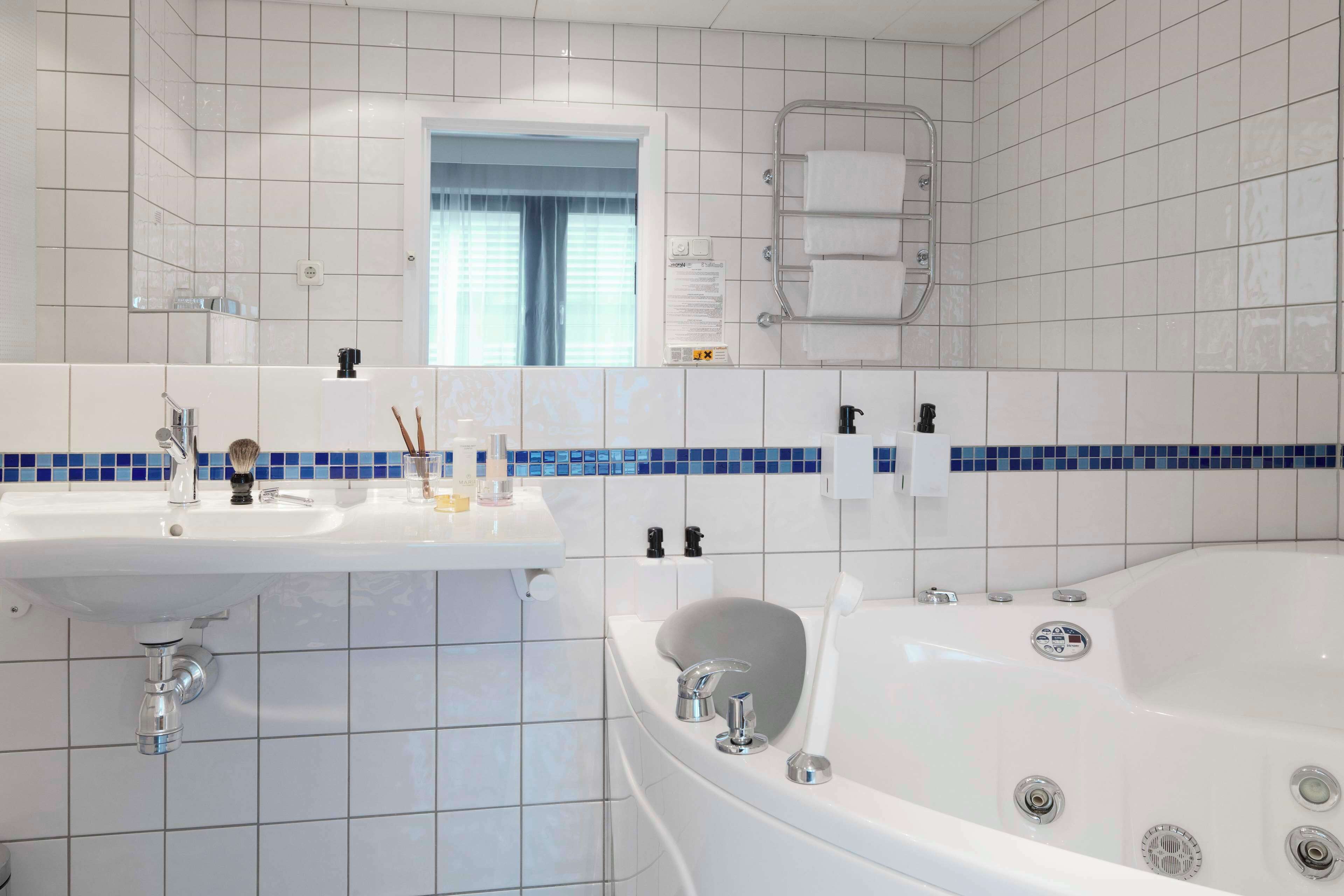 junior suite | 1 bedroom, desk, blackout curtains, iron/ironing board