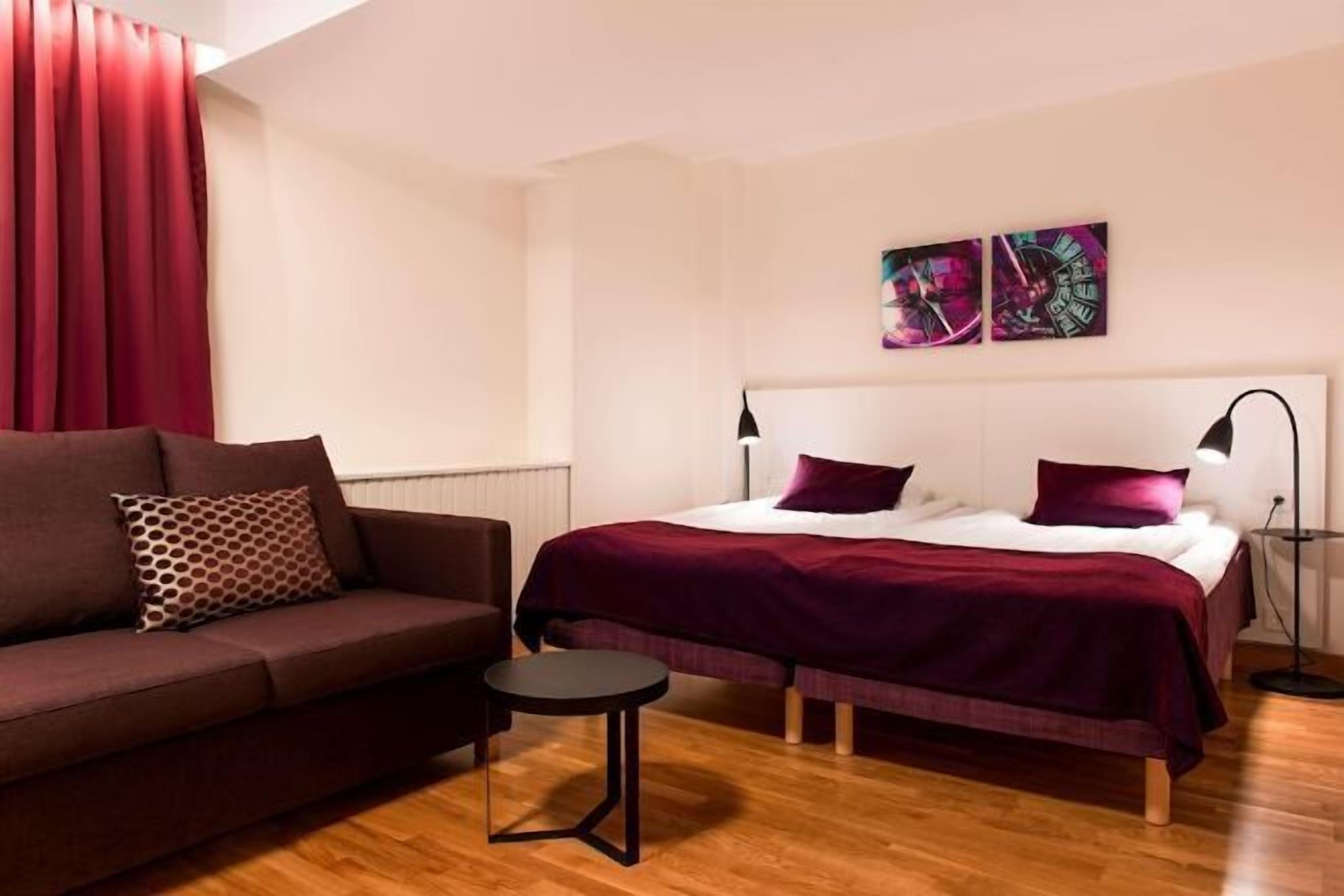 Desk, blackout drapes, iron/ironing board, free cribs/infant beds