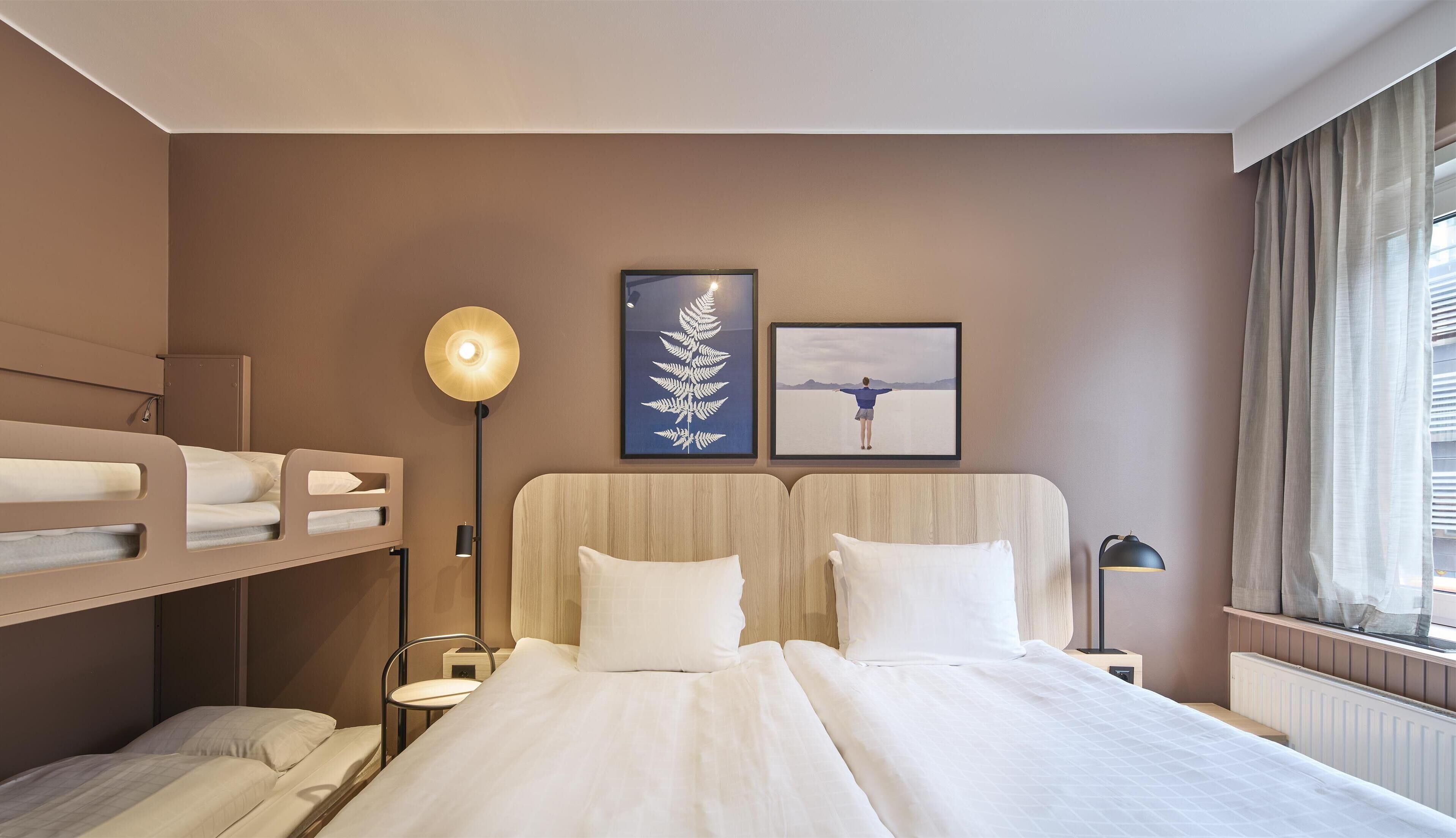 family room | 1 bedroom, desk, blackout curtains, iron/ironing board