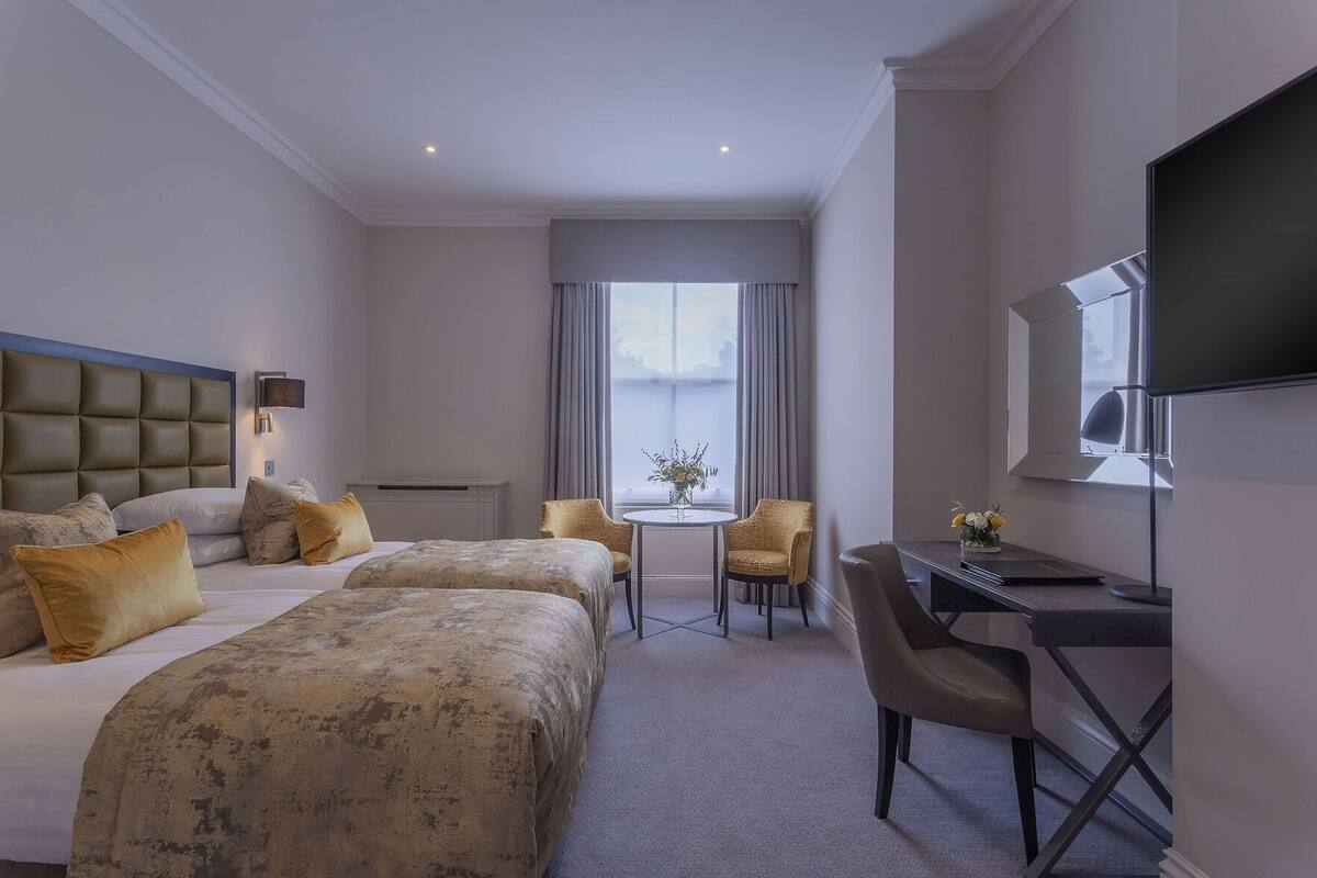 Hypo-allergenic bedding available, in-room safe, desk, laptop workspace