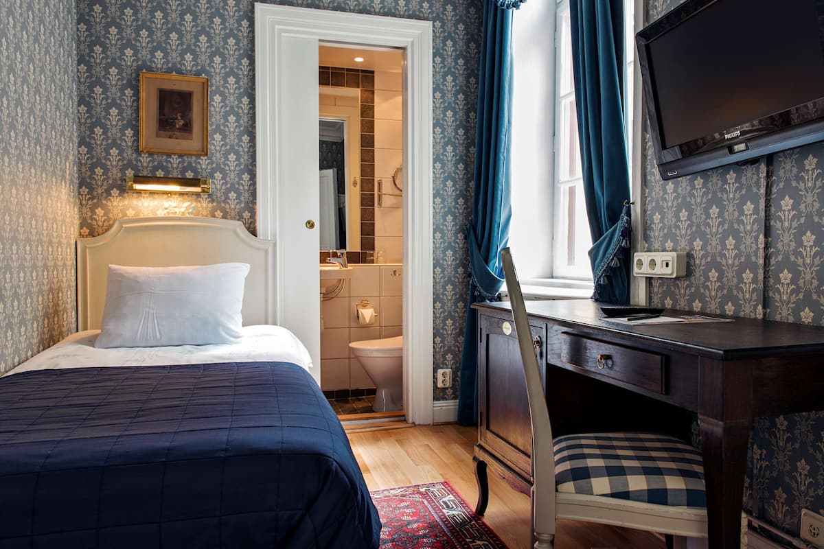 Chambre Simple Standard | Ameublement personnalisé, fer et planche à repasser, Wi-Fi gratuit