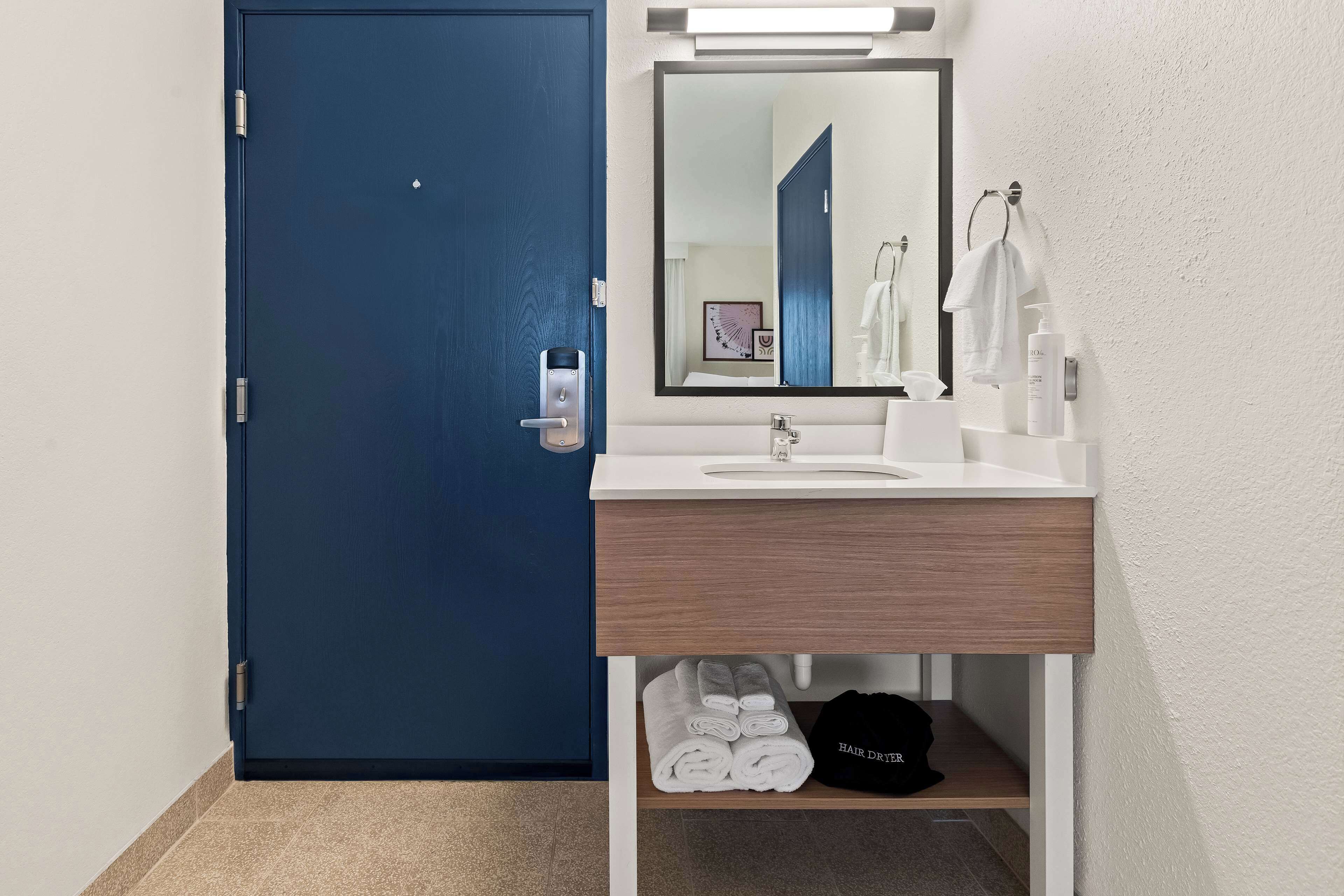 Room, 2 Queen Beds | Bathroom | Combined shower/tub, free toiletries, hair dryer, towels