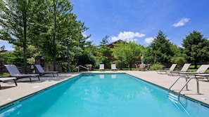 Seasonal outdoor pool, open 9:00 AM to 9:00 PM, pool loungers
