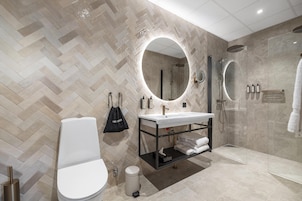 Suite, 1 King Bed, Non Smoking, Terrace | Bathroom | Free toiletries, hair dryer, heated floors, towels