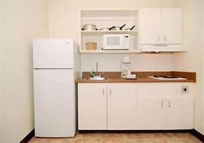 Full-size fridge, microwave, stovetop, coffee/tea maker