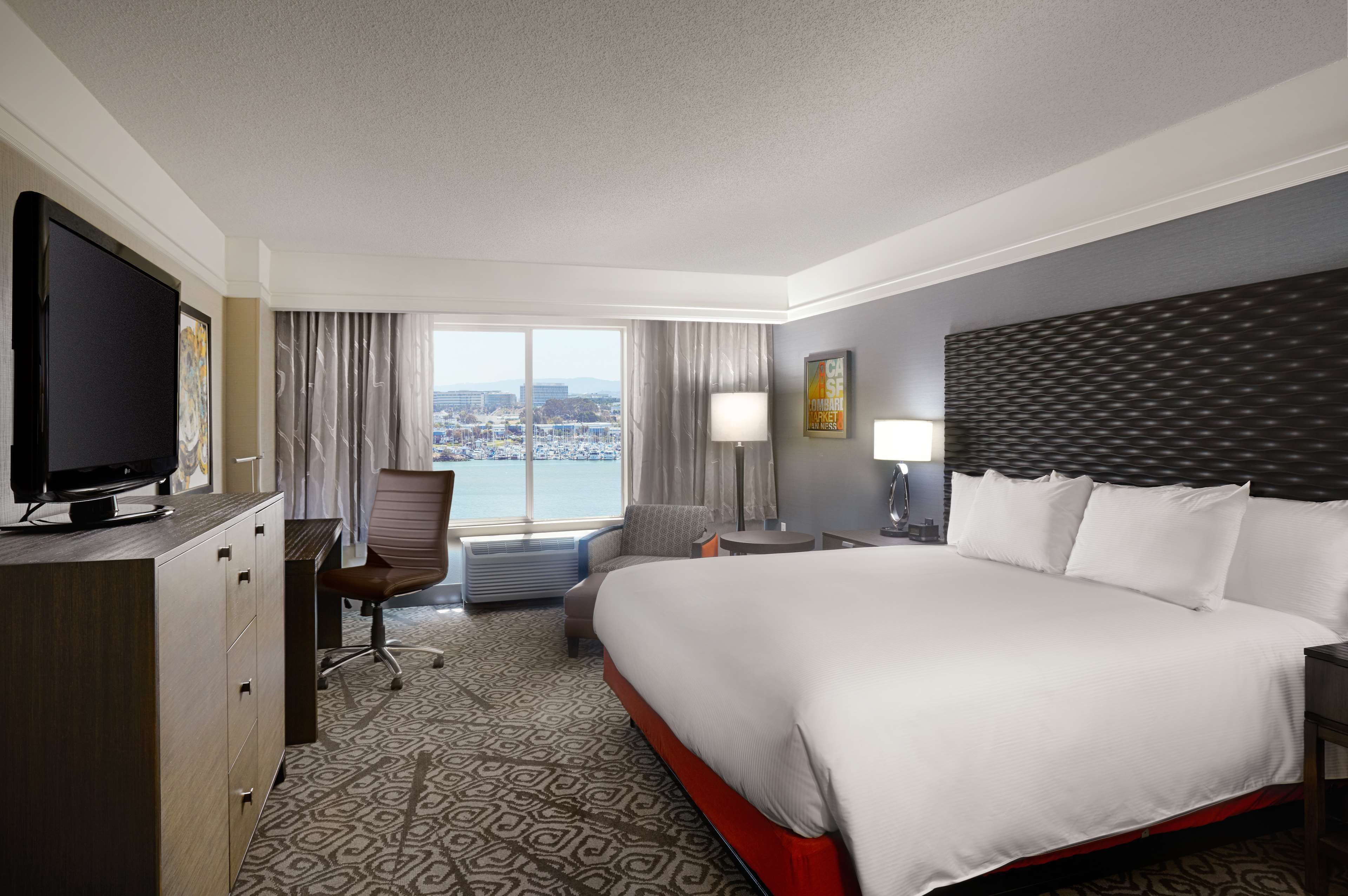 room, 1 king bed, non smoking, bay view | in-room safe, desk, blackout curtains, iron/ironing board