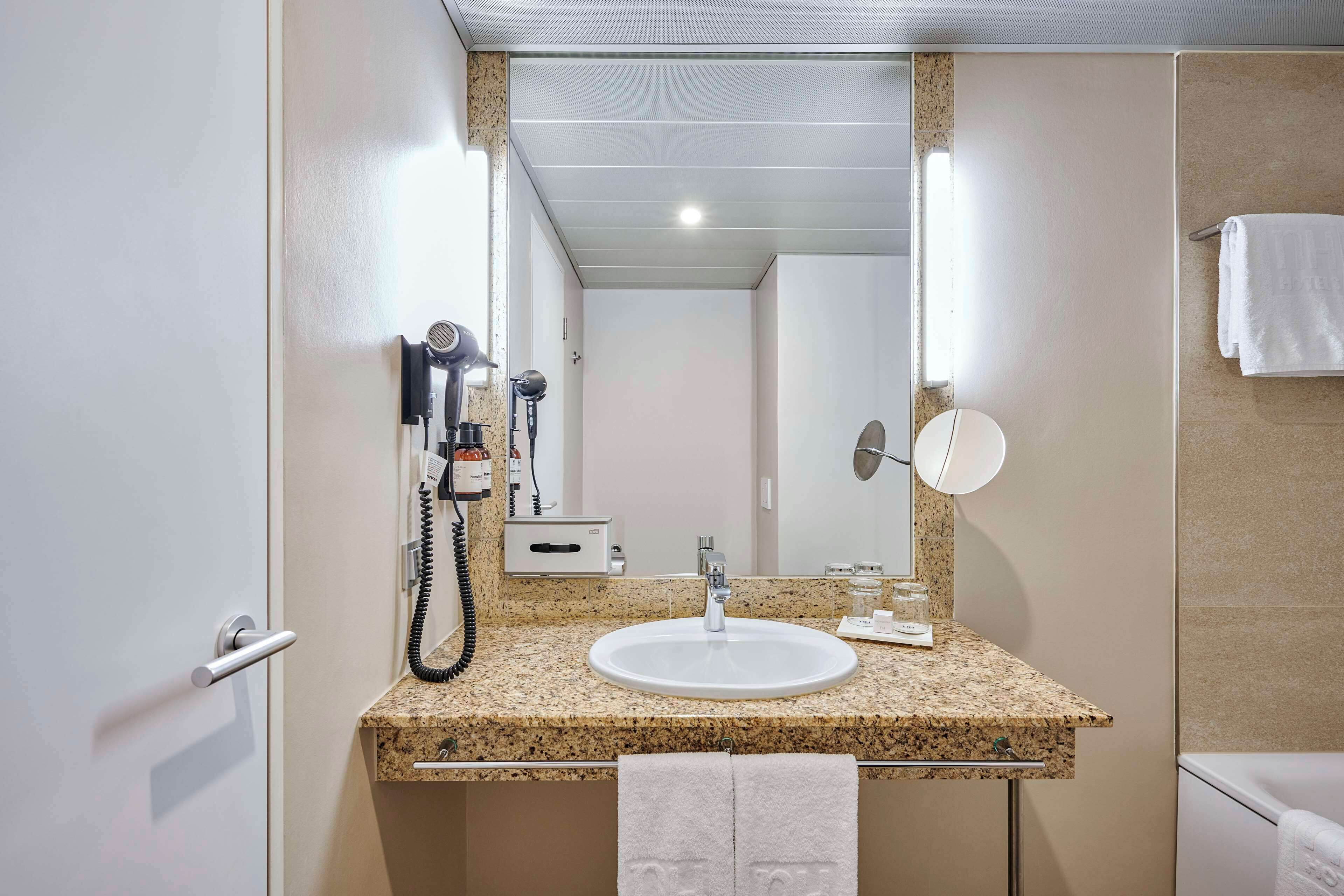 superior room (historical wing) | bathroom | eco-friendly toiletries, hair dryer, towels