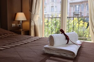 Premium bedding, desk, blackout curtains, soundproofing