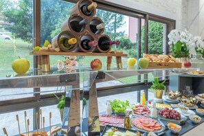 Daily buffet breakfast (EUR 15 per person)