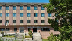 A hotel with a modern facade, multiple windows, and a visible entrance with a staircase. - Hotel Faranda Los Tilos, Ascend Hotel Collection (Teo)