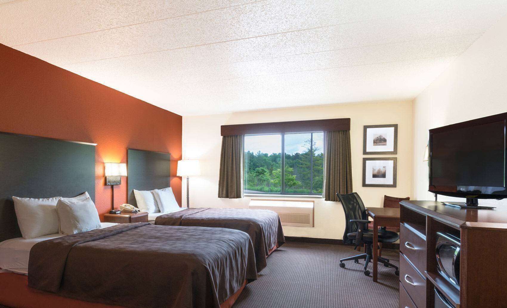 Desk, blackout curtains, iron/ironing board, bed sheets