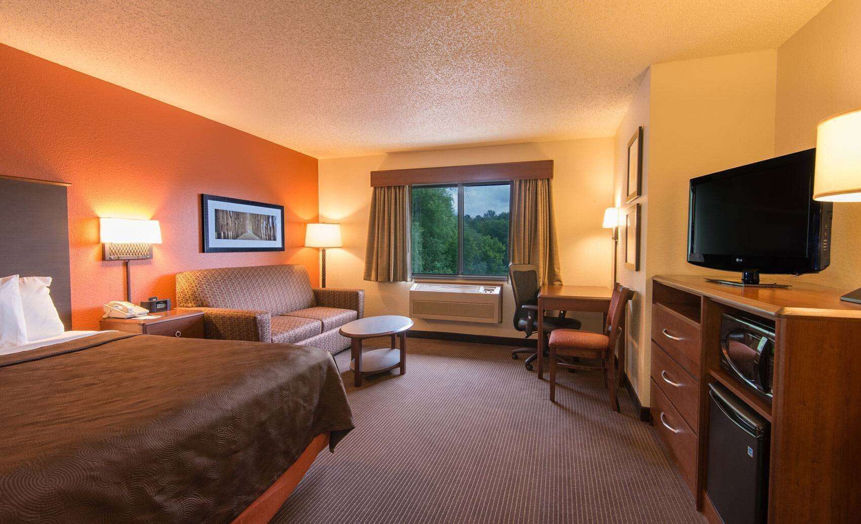 Desk, blackout curtains, iron/ironing board, bed sheets