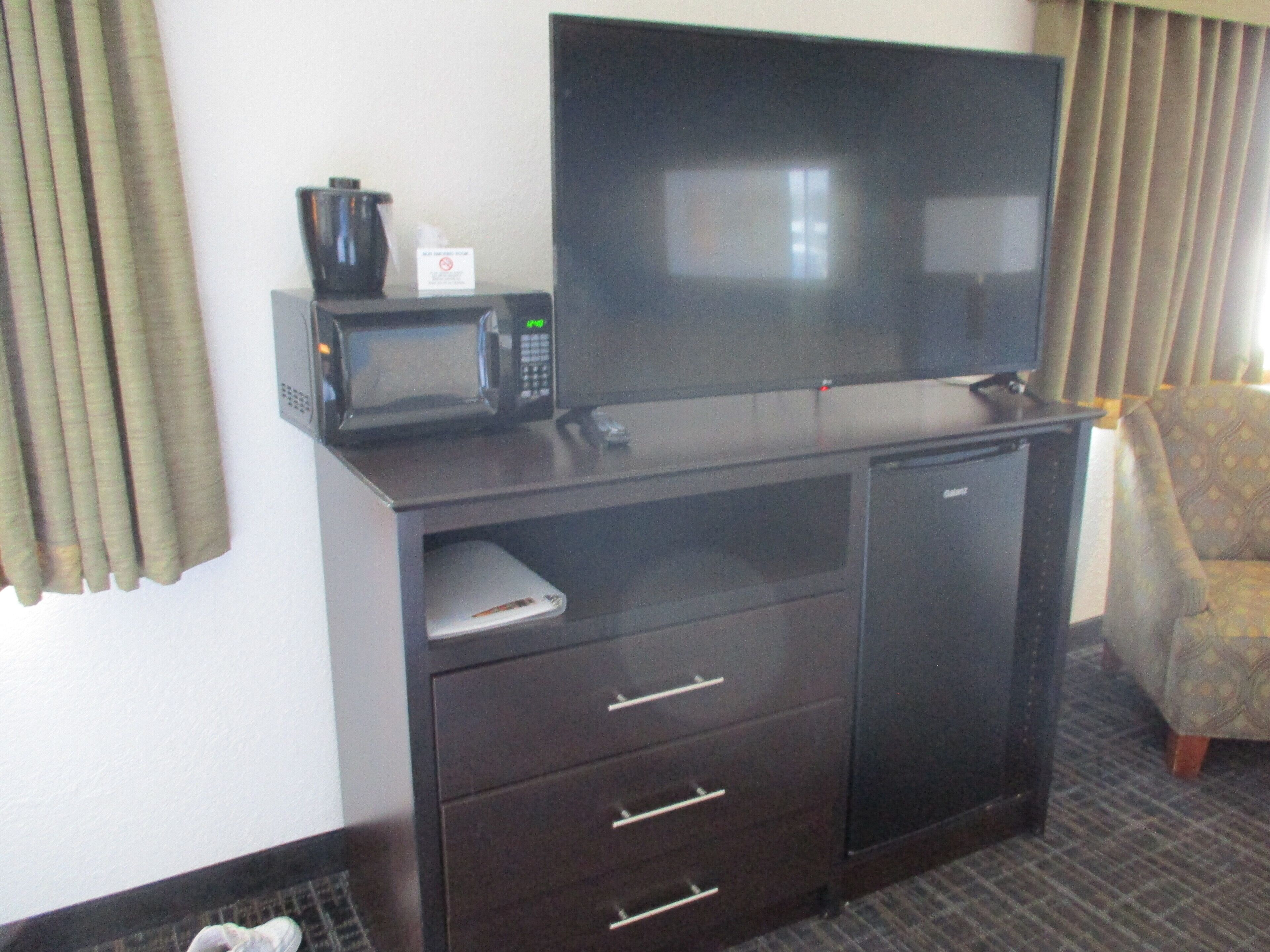 desk, blackout curtains, soundproofing, iron/ironing board