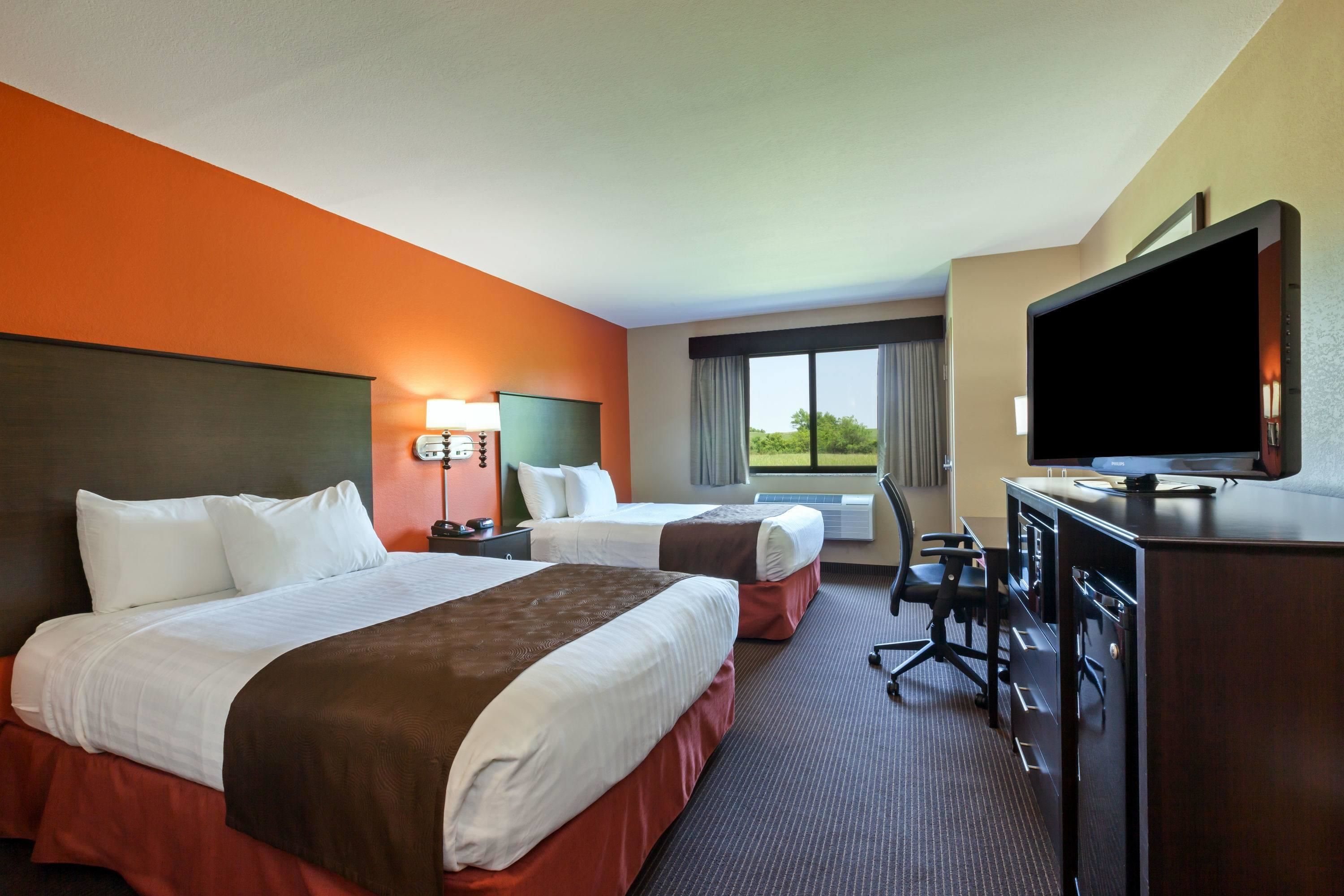 deluxe room, 2 queen beds, non smoking | desk, blackout curtains, soundproofing, iron/ironing board