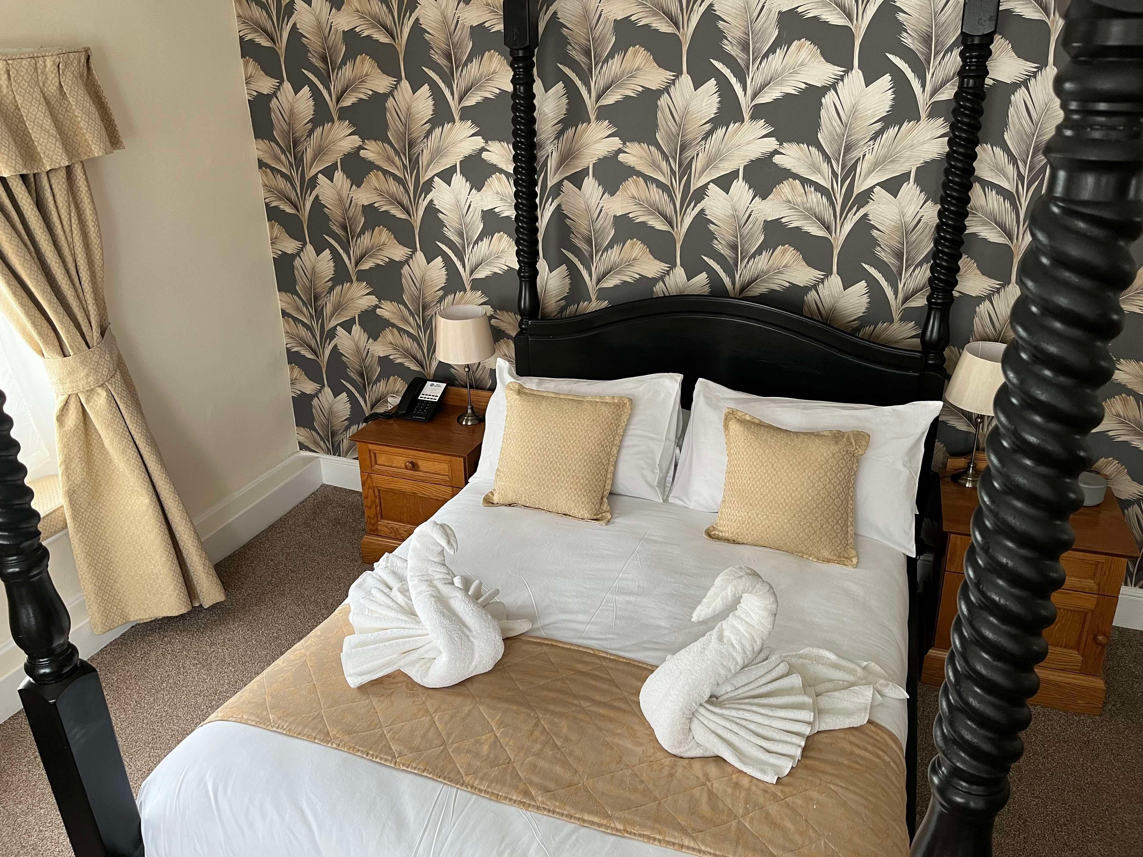 Hypo-allergenic bedding available, in-room safe, desk, laptop workspace
