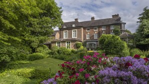 A large brick house with a well-maintained garden and a lawn in front. - Best Western Valley Hotel (Telford)