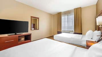 Premium bedding, desk, laptop workspace, iron/ironing board