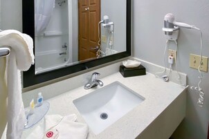 Combined shower/tub, deep soaking tub, free toiletries, hair dryer