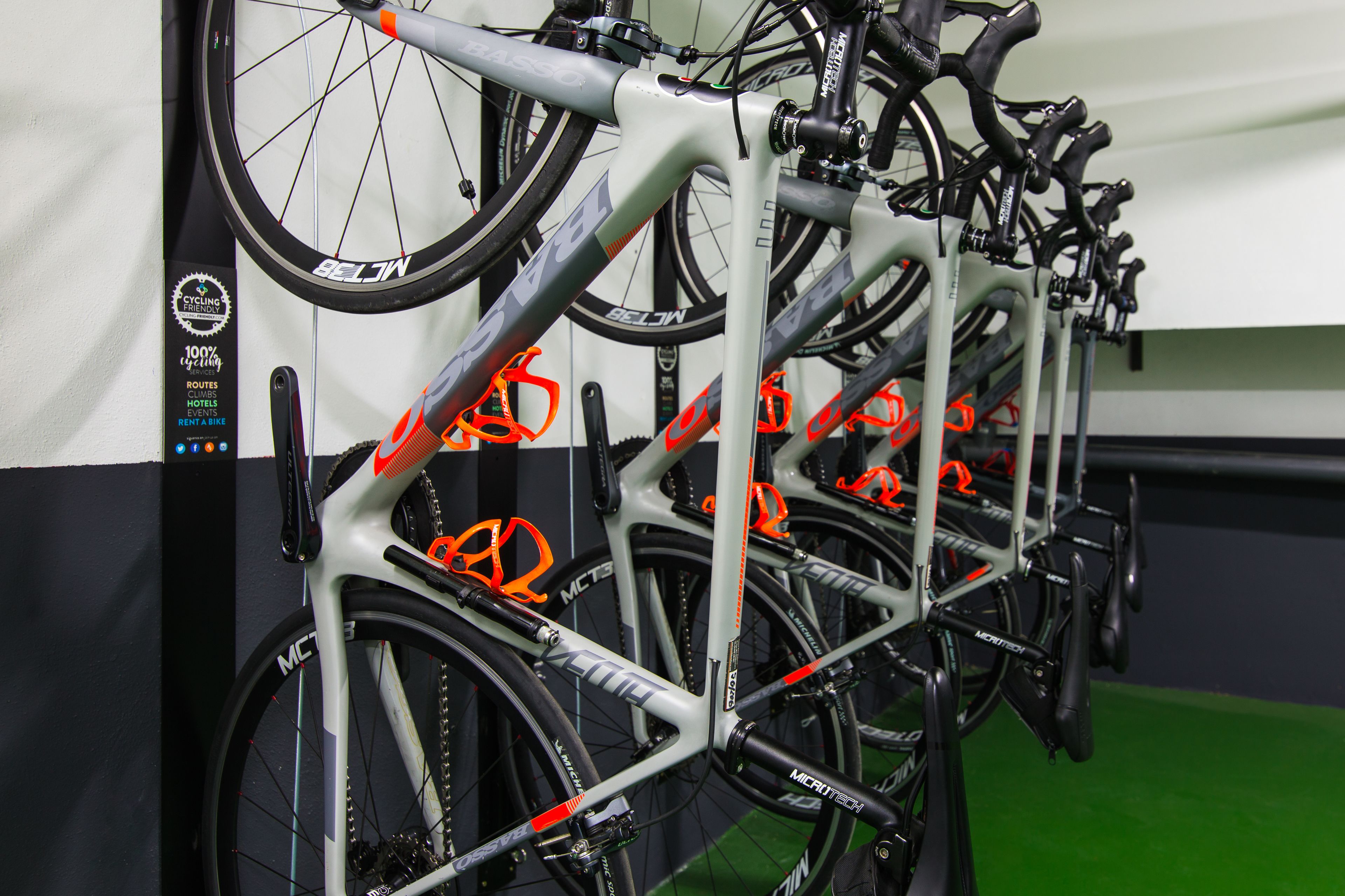 A bike rental station with multiple bicycles.