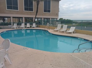 Seasonal outdoor pool, pool loungers