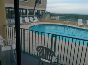 Seasonal outdoor pool, pool loungers