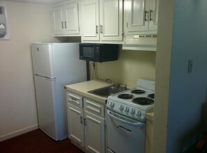Room, 2 Queen Beds | Private kitchen
