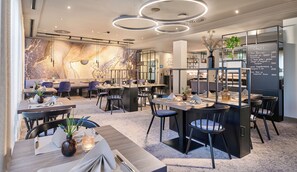 Breakfast, dinner served; local cuisine, al fresco dining 