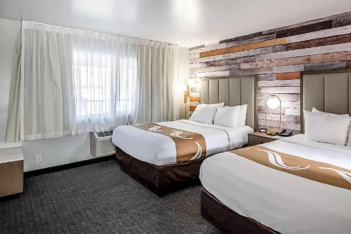 Blackout curtains, iron/ironing board, free cots/infant beds