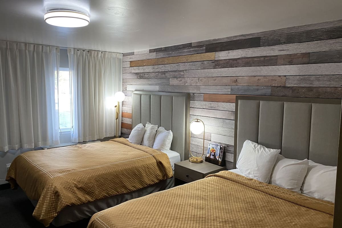 Blackout curtains, iron/ironing board, free cots/infant beds