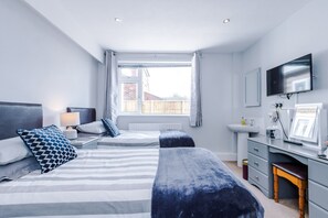 Premium Twin Room, Shared Bathroom | 1 bedroom, desk, blackout drapes, iron/ironing board