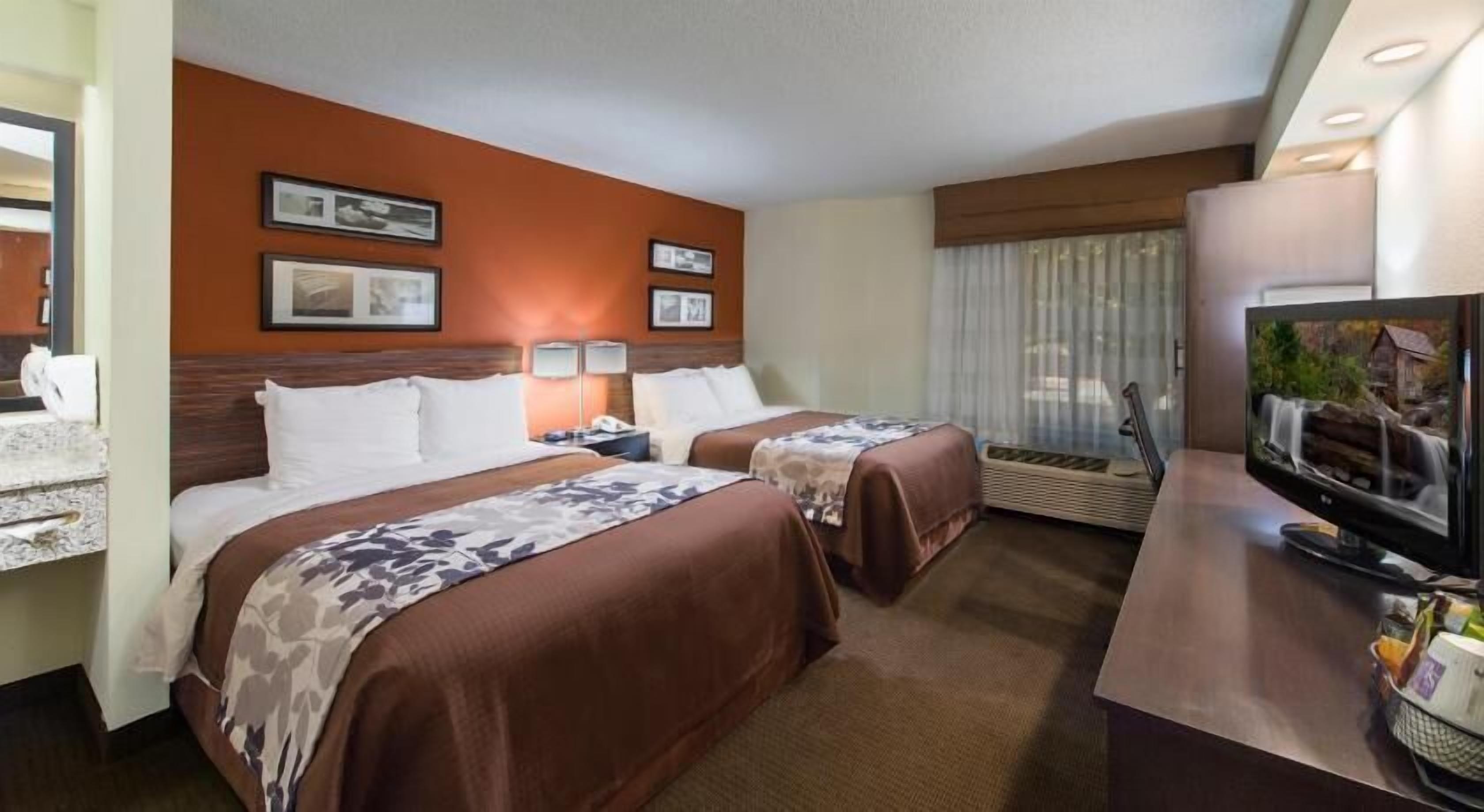 Premium bedding, desk, laptop workspace, blackout curtains