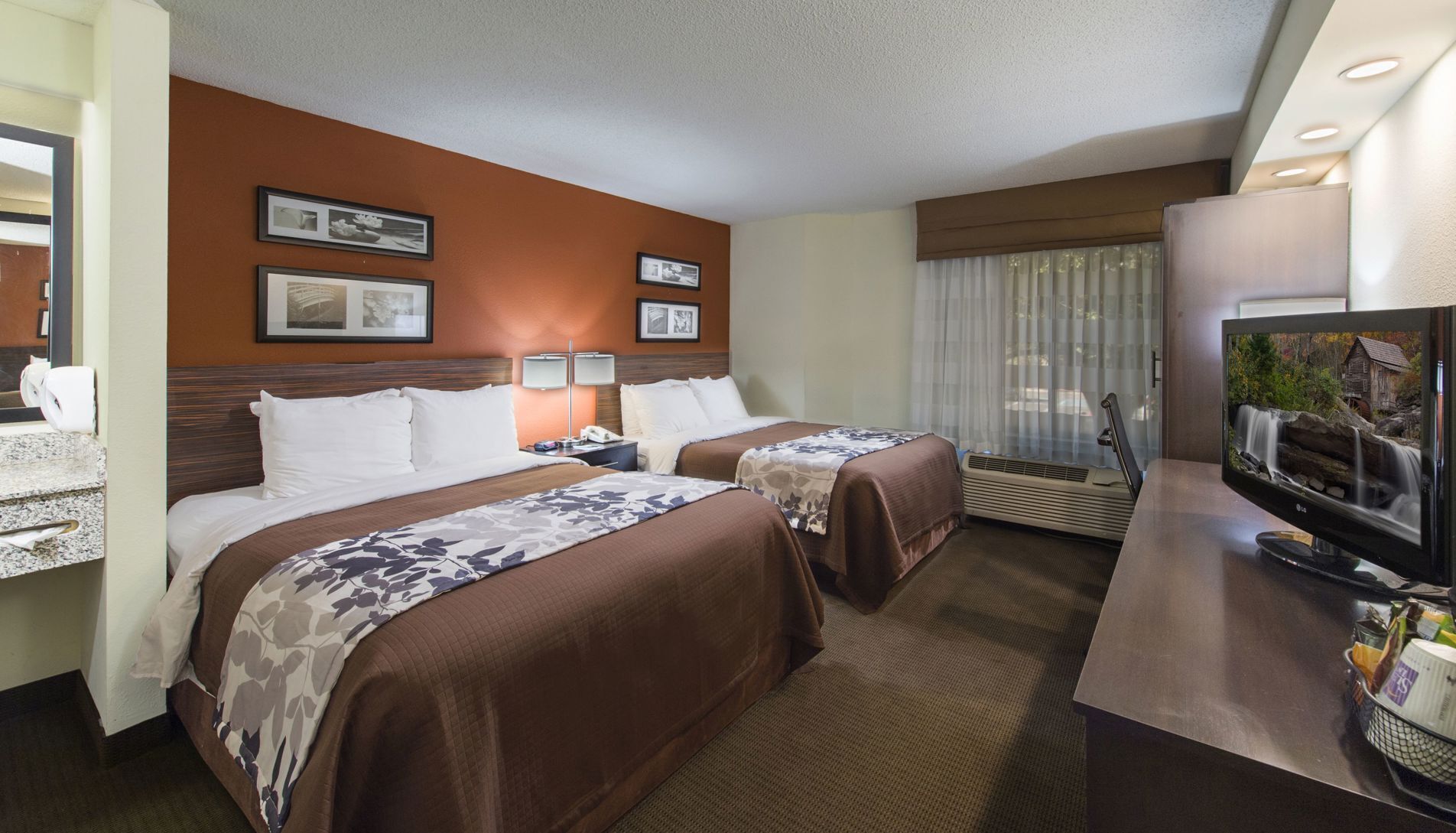 Premium bedding, desk, laptop workspace, blackout curtains